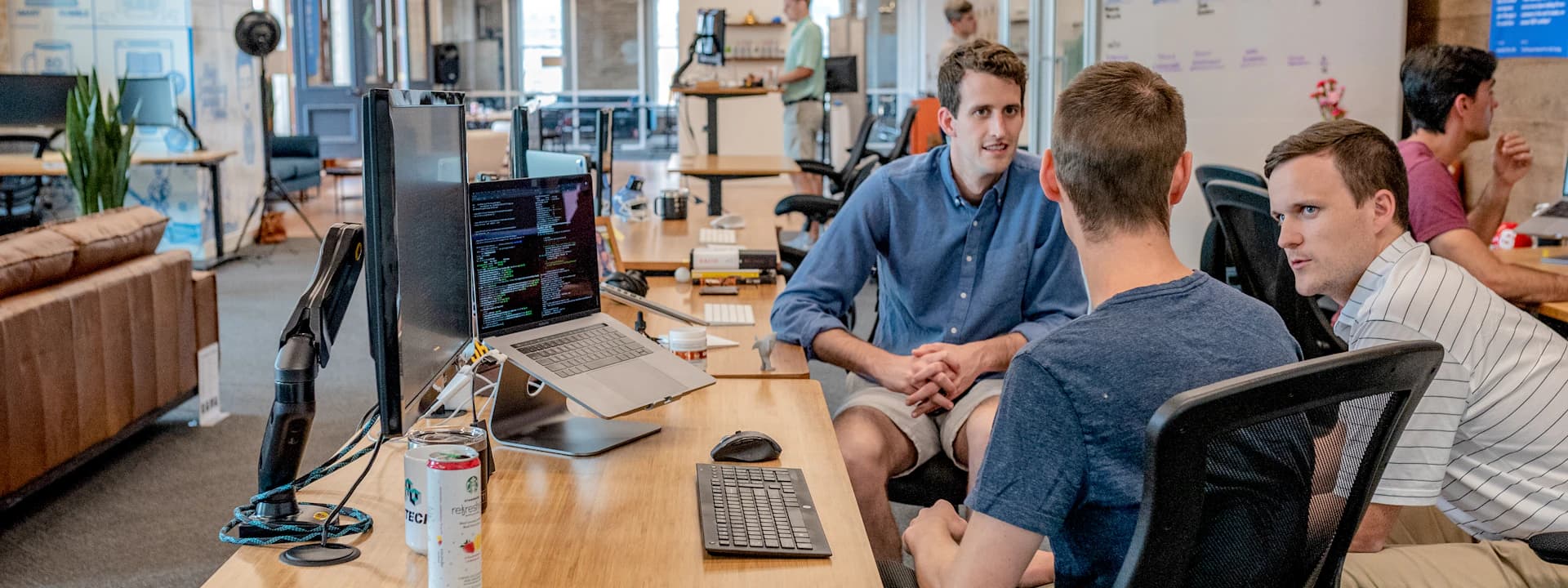 Business support team coordinating work in a modern operations office
